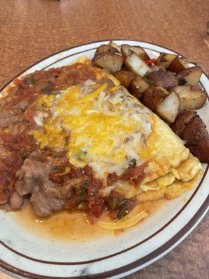 Mexican omelette super dense eggs with everything on top not my kind of omelette