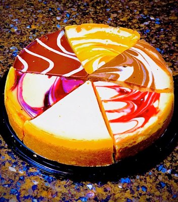 Variety Cheesecake "New York Style, Blueberry Swirl, Double Chocolate Ganache, Peach Swirl, Chocolate Marble & Raspberry Swirl"