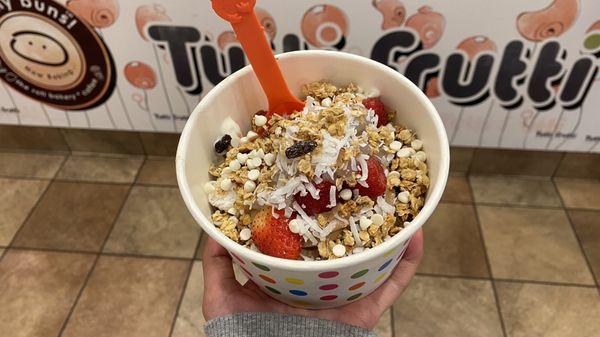 Coconut and Chocolate Yoghurt with granola, raspberry, strawberry, lychee, and white chocolate chips