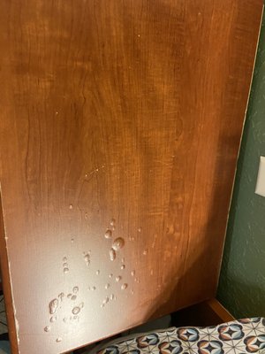 Side table with water damage