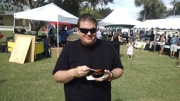 Paul H. Eating some chili from Teds Montana grill, I think he likes it, I see a little smile ;-)