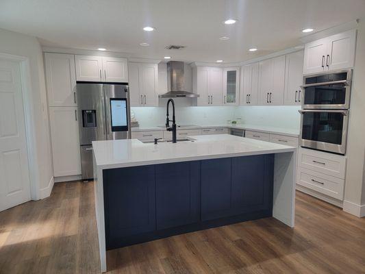 White shaker cabinets with Navy Blue