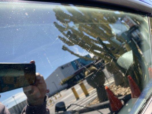 Scratched windows caused by A1 Collision Center