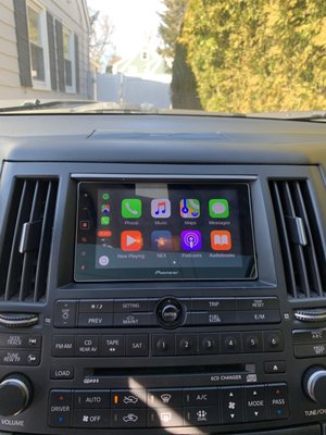 Pioneer MVH 1400NEX CarPlay unit. Replaced the stock screen, which was relocated to the clock area.