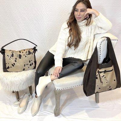 Reine Krief's new collection of leather handbags, made in Italy and fashion comfort leather footwear, made in Portugal.