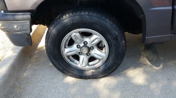 Possibly underinflated new Firestone tire.