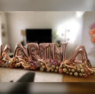 Letter balloons and arrangements different color and size