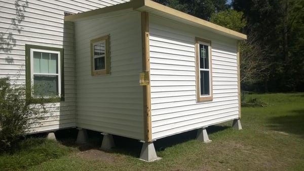 A small addition to a lovely cottage--inside, a wheelchair accessible bathroom