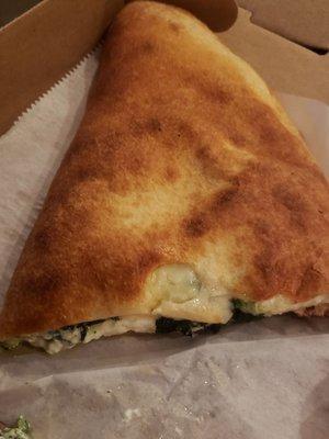 That's a half of a spinach calzone. It was yuge.