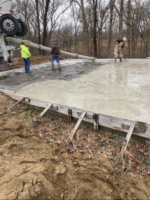 Tune Concrete coming down the Shute.  Pouring a 30' x 36'  slab for a Shop/Garage.