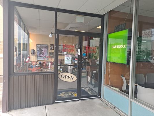 Entrance doors into the store, next to H&R Block