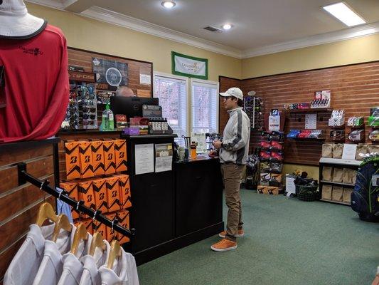 Inside the golf shop. Check-in and payment counter.