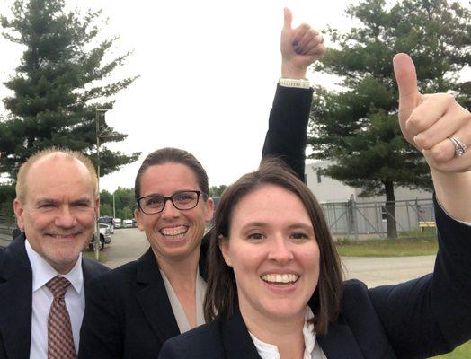 Celebrating a Lemon Rv Trial victory - outside the factory front gate in Elkhart