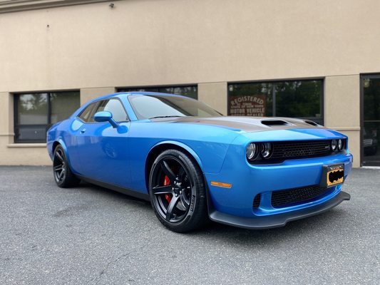 Hellcat Redeye finished with a satin black vinyl wrap hood. Full front paint protection film and a ceramic paint sealant on top!