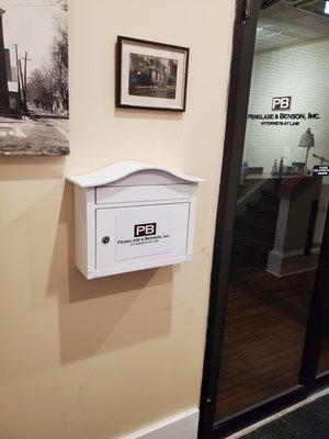 A drop box is provided for secure after hour document dropoff