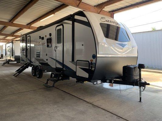 We sell Forest River Surveyor Travel Trailers!