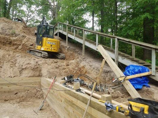 new retaining wall being installed