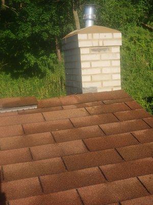 Pointed the chimney, put a new.cement cap on top and dropped a new flexi-liner to the hot water tank.