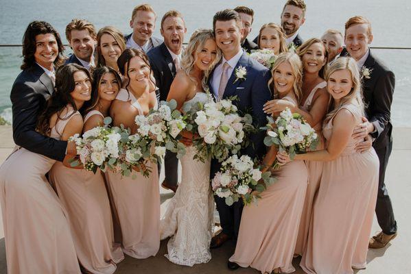 Timeless beach wedding. Who does adore summertime peonies and bridesmaids in blush and the sound of crashing waves?