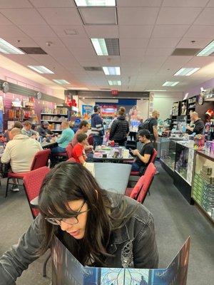 Inside store during "Magic" tournament