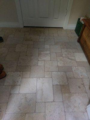 Unique real stone tile for mudroom. Looks great.