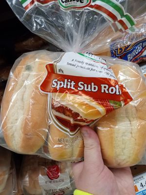 Moldy bread expired a couple of days ago still on the bread shelf in bread aisle