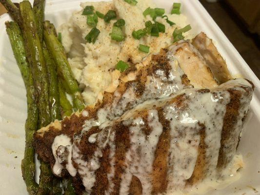 Baked salmon, mashed potatoes and asparagus