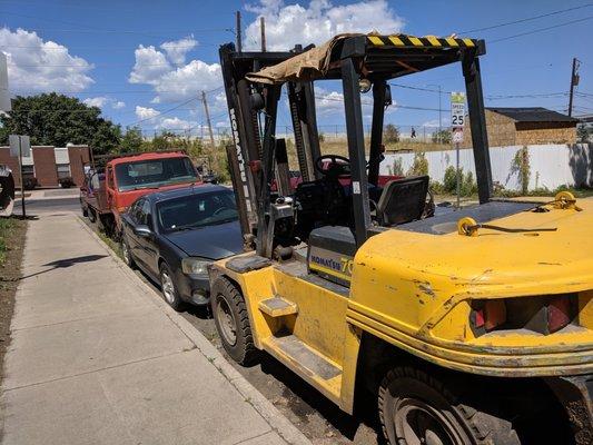 broke down trucks, cars, forklifts street parked illegally at all times