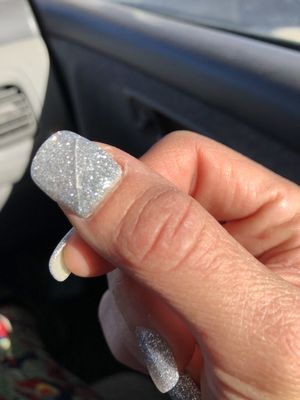 Crack right in the middle of my thumb nail after only one week. A $60 powder dip manicure should last at least 2-3 weeks.