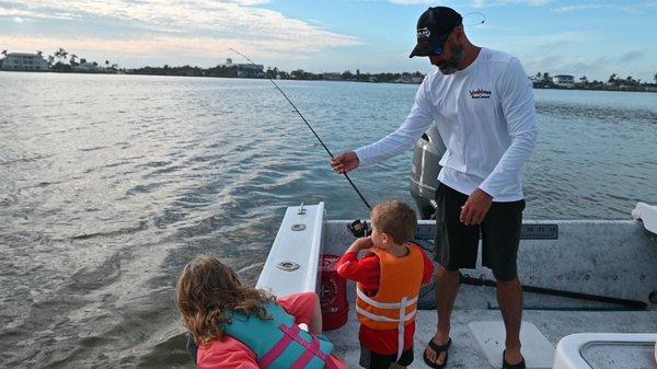 Captain Dylan helping the kids