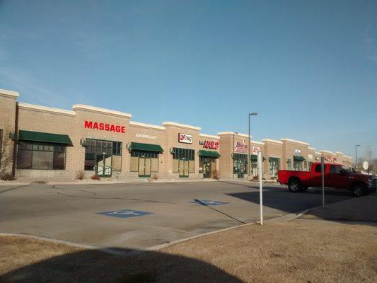 The front of the strip mall where the B&B is located