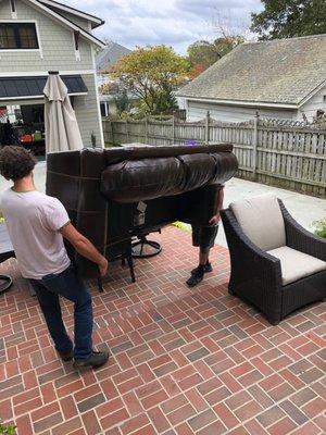 Experienced professional movers, Micah & Quinton, on a job in Durham