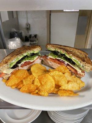 E's. T. A.  Turkey & avocado sandwich. Side of ZAPP'S chips included.