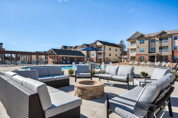 Relax around the firepit near the resort style pool.