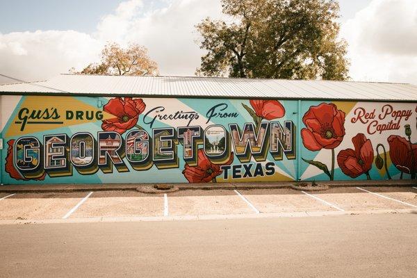 Famous "Greetings from Georgetown" mural is located at Gus's Drug, the best pharmacy in Georgetown, TX!