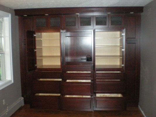 We also design & install entertainment centers & walk-in closets