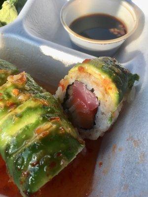 Alabama roll. Tuna, salmon, avocado, Thai chili sauce.