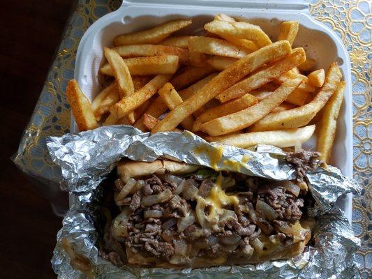 1/2 cheesesteak with fries.  Combo #1