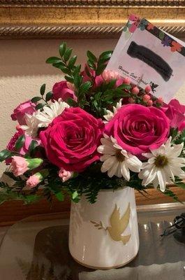 They set up the table where everyone signed in beautifully with the flowers that arrived that morning.