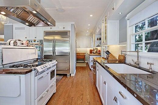 Kitchen remodel that included expansion, custom cabinets with period appropriate detail, island cook/prep area Laguna Beach,CA