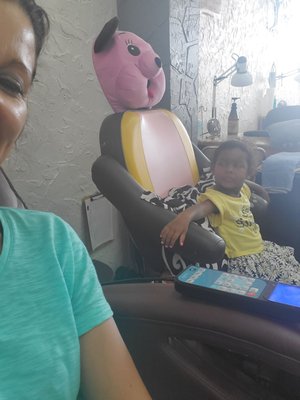 3 year old grandaghter and grandma getting pedicures.