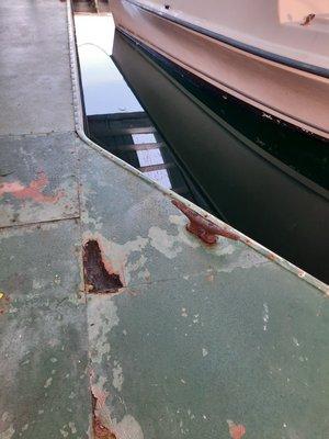 Rusting cleats and holes in the dock at almost every slip!