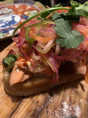 An open-faced salmon bang mi