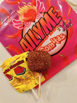 Paletas de Sandía- Watermelon lollipops covered with tamarindo.