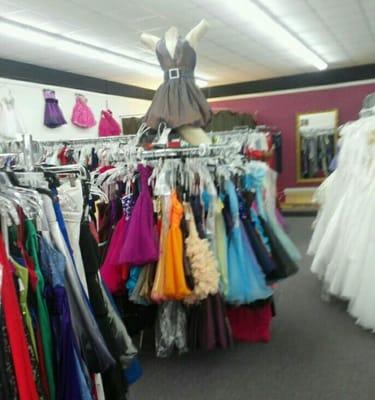 Name brand short formals for all occasions!! Wedding dresses all prices and styles over 1/2 off or more of retail prices!!