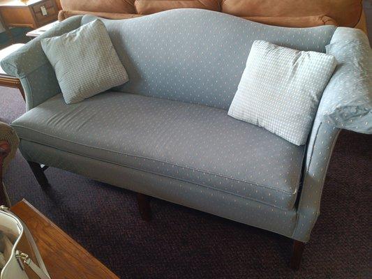 Contemporary sofa, blue with light design, 2 sofa pillows sofa arm covers.excellent condition