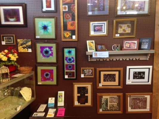 Framed photos by Robin Field of Robin's Nest Creations inside Little Shops.