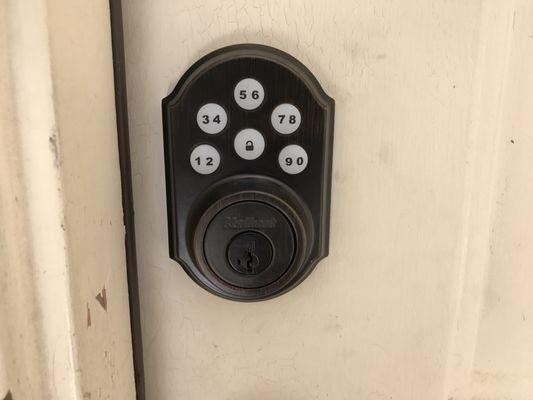 Don't worry about keys anymore with an electronic combination door lock. Capable of syncing to your alarm system.