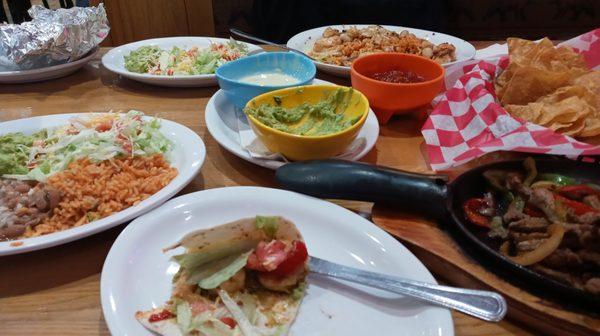 Steak and Shrimp Fajitas. The husband had a dish with lots of Spanish rice, Queso, shrimp, scallops, & faux crab. You do NOT leave hungry!