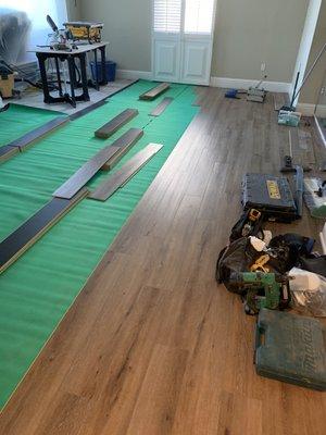 Installing brand new waterproof flooring at siesta key, Fl